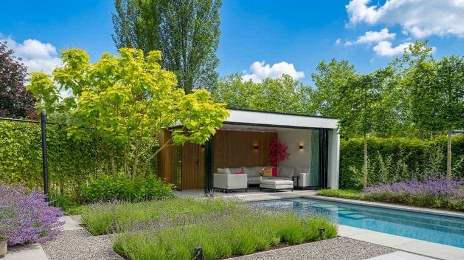 Mediterrane tuin met zwembad en poolhouse door Sparq Tuinen
